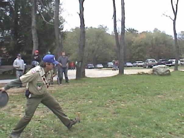 Rich Ashford throwing a dutch oven lid.