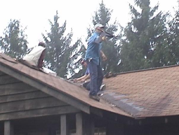 Working on the trading post roof.